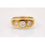 A diamond and 18ct yellow gold ring, the central round cut diamond with small round cut diamond to