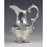 A Victorian silver milk jug, Samuel Hayne and Dudley Cater, London 1845, the moulded rim above an