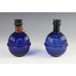 A pair of Hardens 'Star' cobalt blue fire grenades, of typical ribbed bulbous form, moulded with the