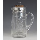 A Harrods cut glass iced water or lemonade jug, 20th century, of tapering cylindrical form decorated