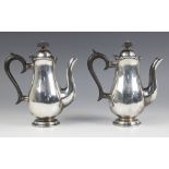 A pair of Edwardian silver bachelors coffee pots, The Alexander Clark Manufacturing Co, Birmingham