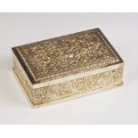 An Eastern style silver plated jewellery casket, of rectangular form, elaborately embossed with