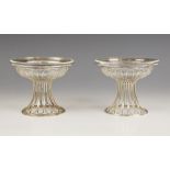 A pair of Edwardian silver pedestal bonbon dishes, Mappin and Webb Ltd, Birmingham 1907, with open