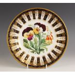 A porcelain cabinet plate, probably Coalport, the well enamelled with floral sprays within a gilt