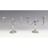 A pair of Edwardian silver candelabras, Ellis & Co, Birmingham 1906, the tapering fluted stems above