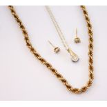 A diamond 9ct gold necklace, the brilliant round cut diamond within a 9ct gold crimped border and