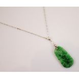 An Art Deco jade and diamond necklace, the pearl and old cut diamond mounted white metal spacer