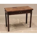 A George III mahogany tea table, the fold-over top and single frieze drawer, upon legs of