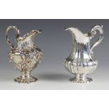 A Victorian silver milk jug, possibly William Eaton, London 1845, the cast scrolling rim above an