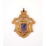 A Victorian 9ct gold Liverpool cross country fob medal, the shield shaped medal with raised