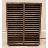 A printers rack by Hampson, Bettridge and Co, London, late 19th/early 20th century, of slatted