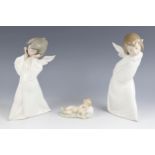 Three boxed Lladro figurines, comprising: a 4959 Angel Mimico [Mime Angel], a 4960 Angel Farolero [