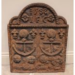A cast iron fireback, of break arch form, cast in relief with year 1588, the initials 'I.F.C', two