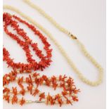 A 'white coloured coral' necklace, designed as a series of cylindrical branches, with yellow metal