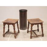 A pair of 19th century oak stools, each with a moulded square top and shaped apron upon turned and