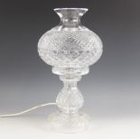 A Waterford Crystal table lamp, 20th century, modelled as an oil lamp with hobnail decoration,