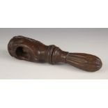 A continental treen carved walnut nutcracker, 19th century, modelled as a human head with open