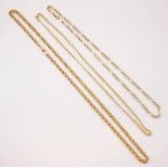 A gold-coloured fancy link necklace, designed as a flat double curb link chain with lobster clasp,