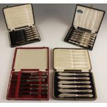 A cased set of George V silver handled cheese knives, John Biggin, Sheffield 1915, with five prong