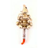 A 19th century children's rattle, 'IT' , Birmingham, the silver mount with engraved floral