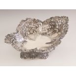 An Edwardian silver dish, Mappin and Webb Ltd, Sheffield 1901, the floral and scroll embossed rim