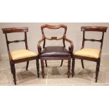 A Regency mahogany elbow chair, the compressed rail back extending to down swept arms with