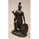 A floor standing bronze figure of a Roman centurion, late 20th century, modelled wearing a galea (