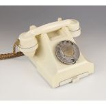 An ivory Bakelite GPO pyramidal telephone, circa 1960's, type 332F S50/2A, with a 164 type handset