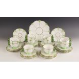 An Aynsley tea service, early 20th century, each piece decorated with a stylised flower