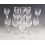 Fourteen cut glass wine glasses, each on faceted stem and star cut base, each 16.5cm high (14)