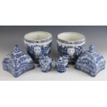 A pair of Chinese craquelure glazed blue and white cache pots, 20th century, each of cylindrical