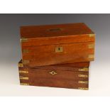 A 19th century mahogany campaign writing box, applied with brass corner brackets and inset swing