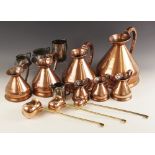 A collection of seven haystack copper measures, late 19th/early 20th century, each applied with a 'H