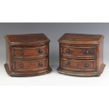 A pair of Victorian burr walnut desk top chests, of moulded bowfront form, each with two convex