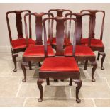 A set of six Queen Anne style mahogany dining chairs, 19th century, each with a concave splat