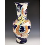 A large Chinese floor vase, 20th century, the baluster shaped vase decorated with a tiger and a