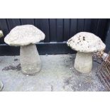 Two sandstone staddlestones, of mushroom form, 53cm H x 50cm D and 66cm H x 50cm D (2)