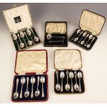 A selection of cased silver flatware, to include a set of George V silver teaspoons, James