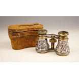 A pair of Victorian silver mounted opera glasses, 'EL' Birmingham 1882, the floriate embossed