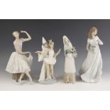 Four Lladro figures, late 20th century, comprising: "Carnival Couple", model number "4882", 26cm