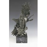 American school (29th century), a bronze patinated spelter figure of a Native American shaman with