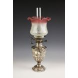 A Victorian silver oil lamp, James Deakin and Sons, Sheffield 1891, the urn shaped body with