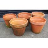 Five large terracotta planters, of typical tapering form, 35cm H x 43cm D (5)