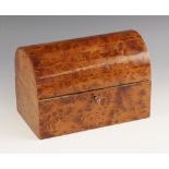 A burr yew and amboyna box, 20th century, the domed hinged cover opening to a vacant interior,