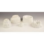 Five jelly moulds, 19th century and later, to include an artichoke example by Shelley, a further
