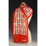 A Givenchy narrow scarf, with red chain style design to the centre surrounded by a red border, the