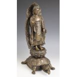 A large Chinese bronze model of Buddha, 19th century, modelled standing on a lotus crown base atop a