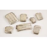 A selection of silver vesta cases and cigarette cases, including a George V vesta case, Wilmot