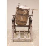 A 'Smith Prize' butter churn, late 19th/early 20th century, the coopered barrel with iron fittings
