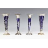 A pair of Edwardian silver posy vases, Thomas Bradbury and Sons Ltd, Birmingham 1906,